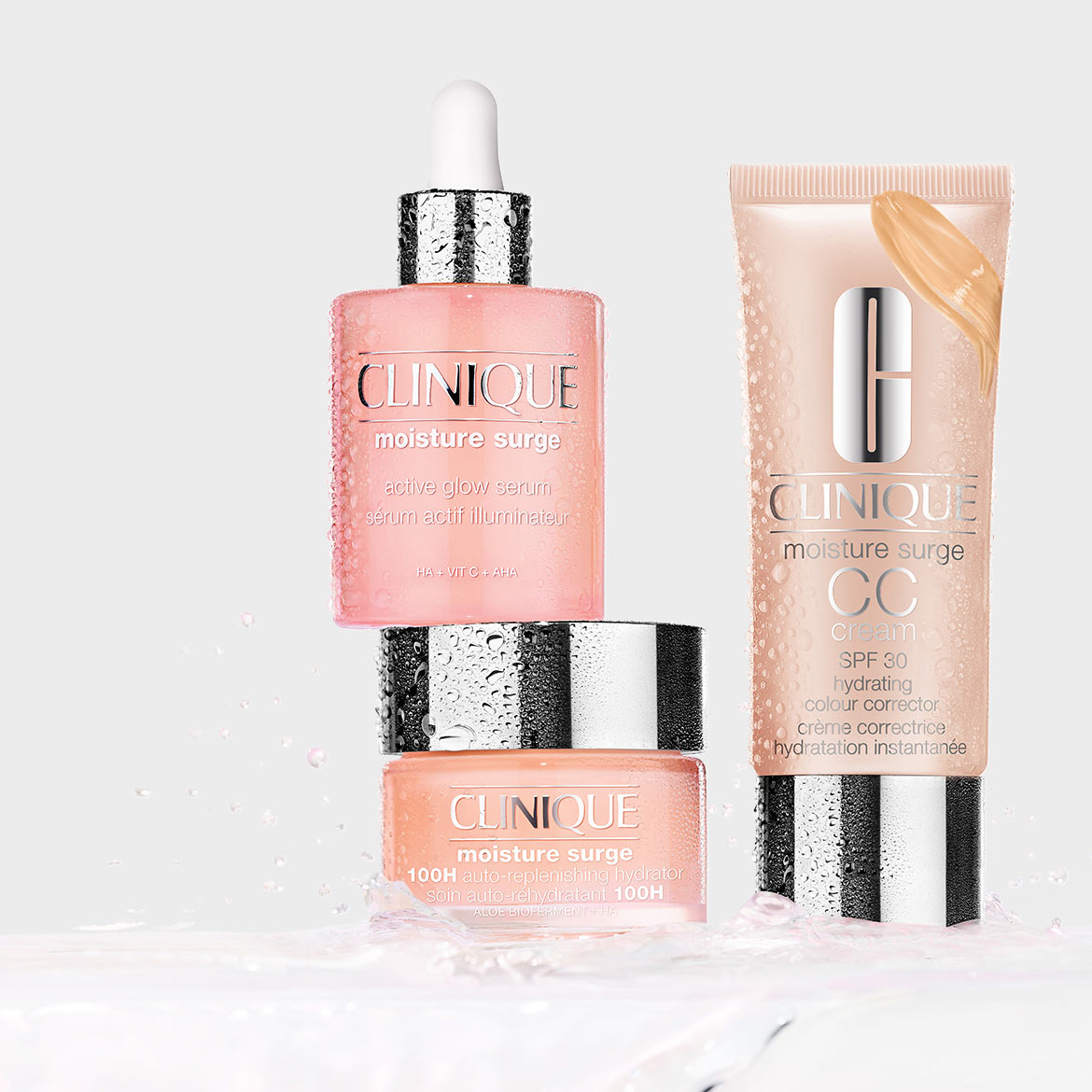 Clinique Moisture Surge collection features a pink active glow serum, a CC cream with SPF 30, and a 100H auto-replenishing hydrator, all designed to hydrate and illuminate skin.