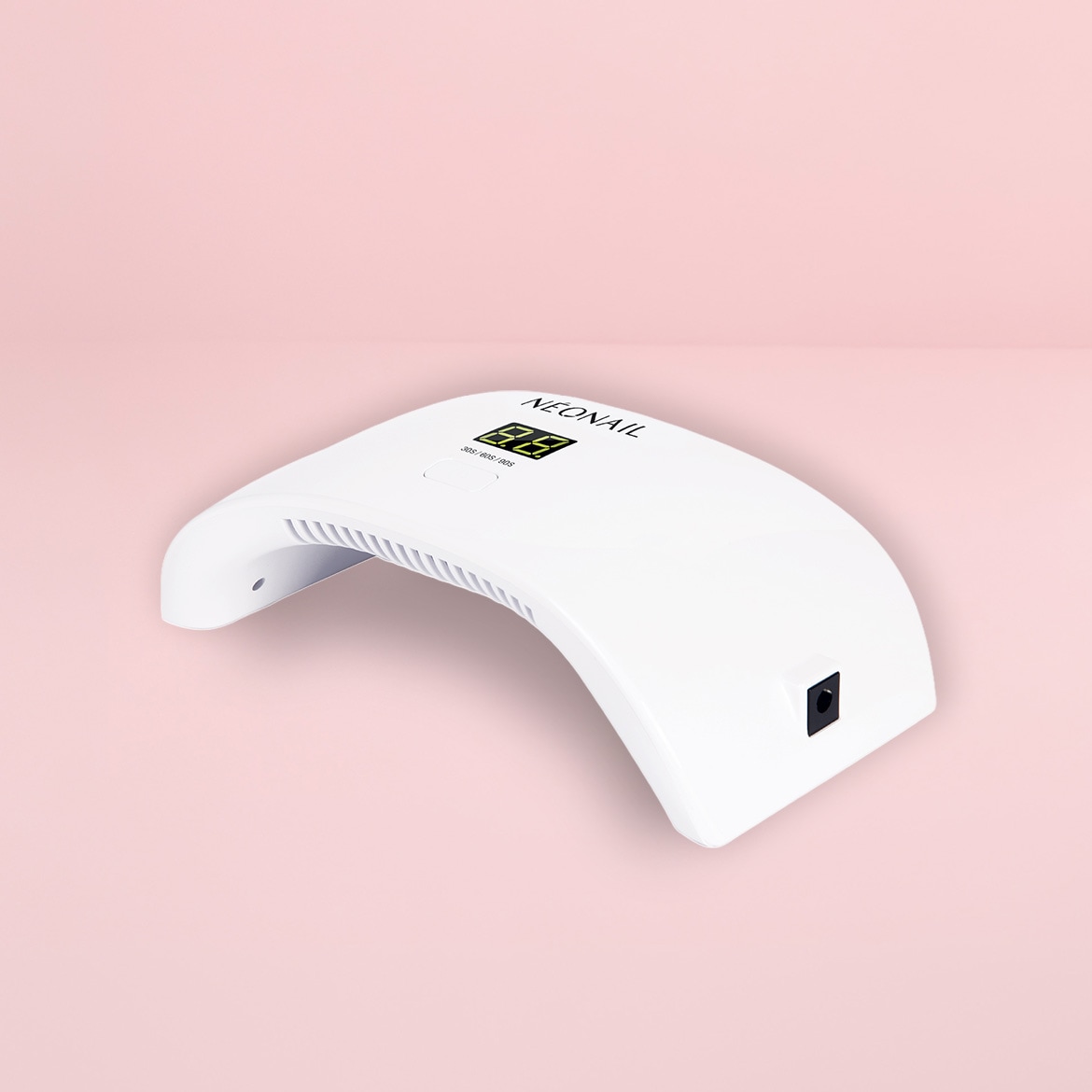 Die weiße NEONAIL UV/LED Lampe 36W/48 mit digitaler Zeitanzeige und Lüftungsschlitzen sorgt für perfekt ausgehärtete Gelnägel.
